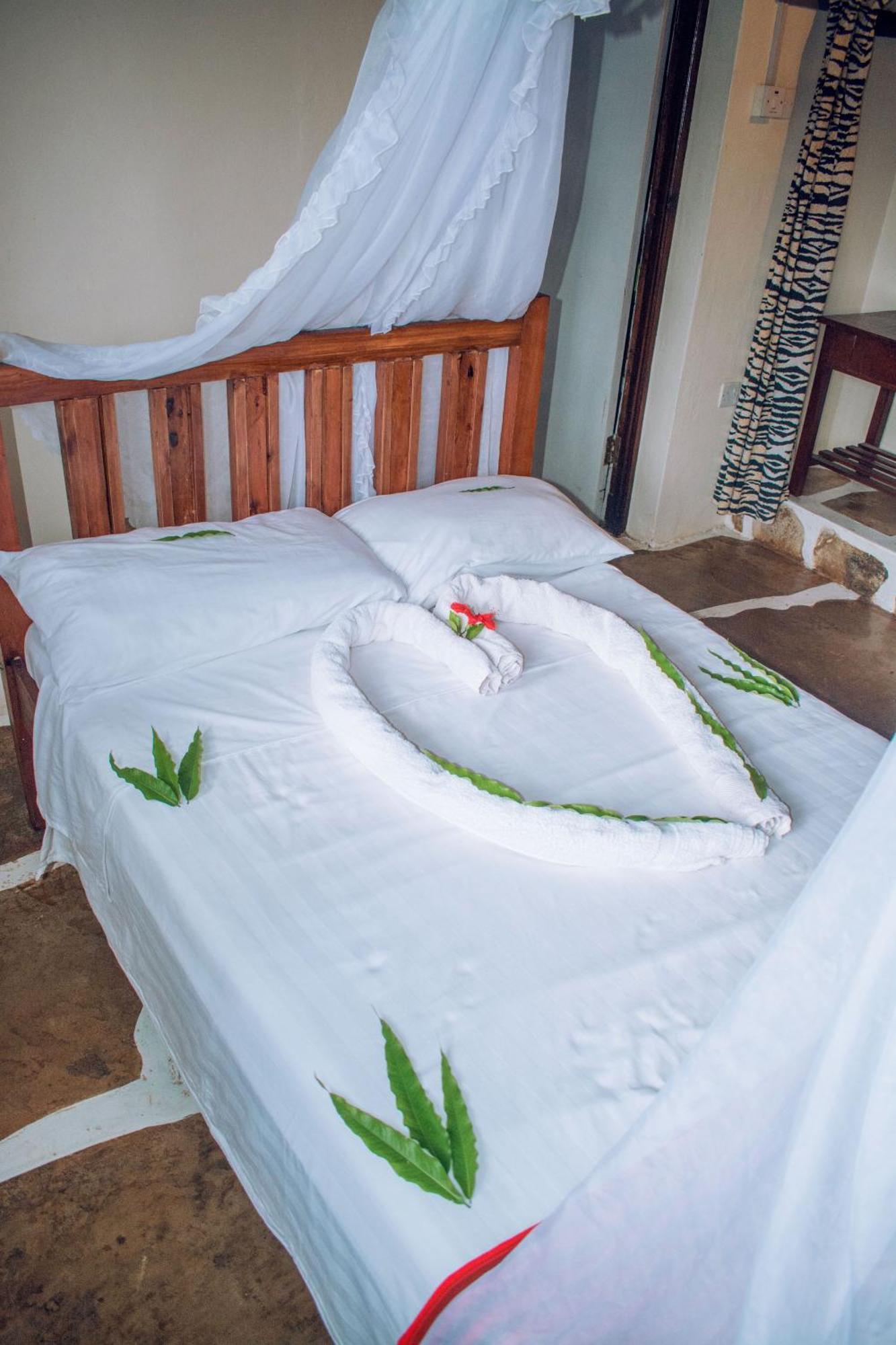 Kijani Cottages In Diani 디아니 해변 외부 사진